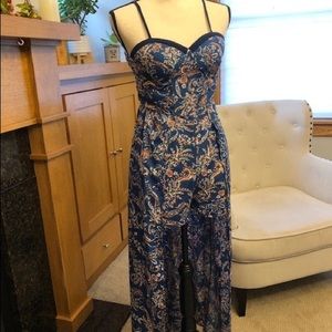 Band Of Gypsies Walkthrough Sleeveless Floral Romper Dress. Adjustable straps.